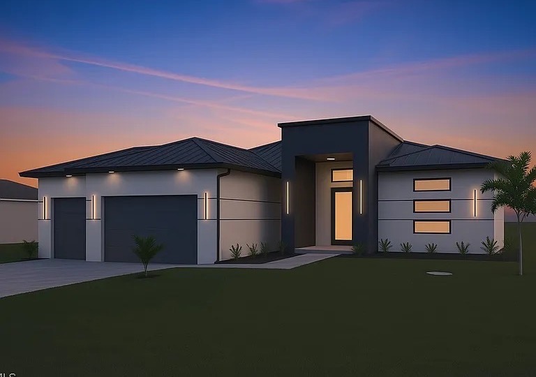 Modern single-story home with a dark metal roof, a two-car garage and a lit entry, seen at dusk